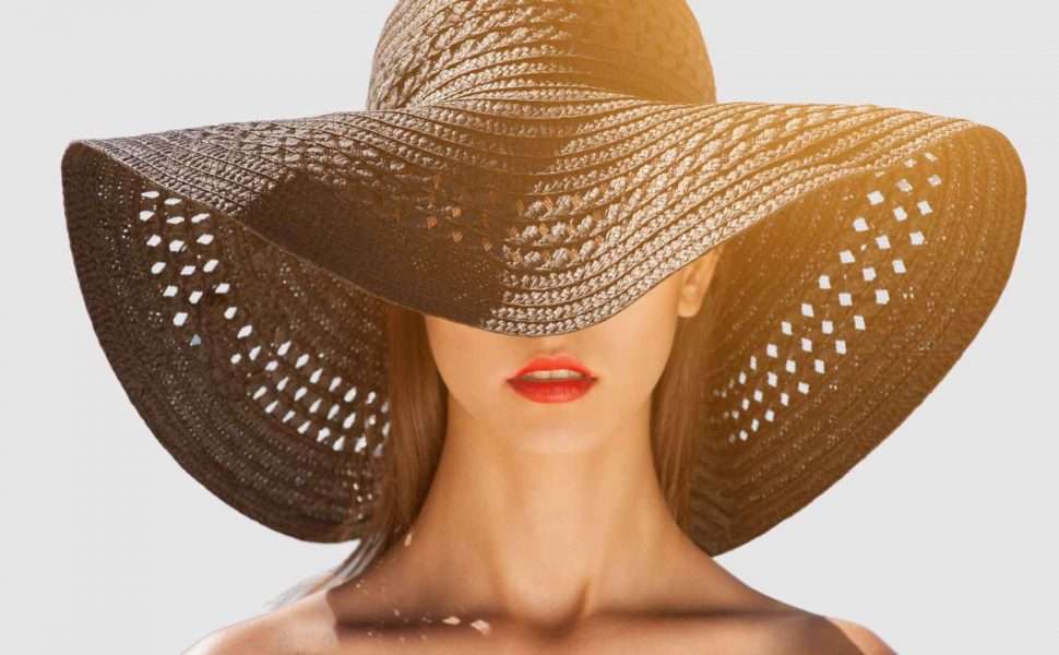Protect Hair from Split Ends with a sun hat in the midday sun